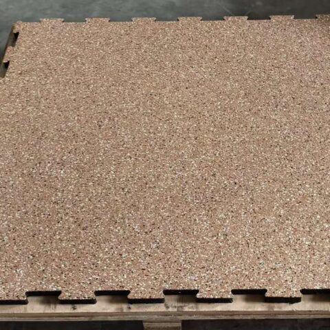 An interlocking composite floor mat, measuring 1 meter by 1 meter and 20mm thick. The mat features a textured surface for grip and is made from durable, black material. It is designed with interlocking edges, allowing multiple mats to connect seamlessly.