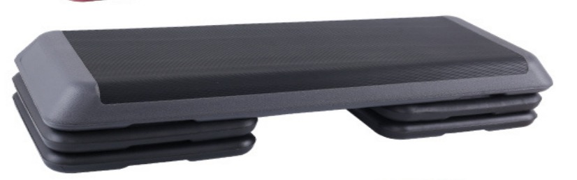 A sleek, 110cm long leather step board in grey, featuring a non-slip textured surface for enhanced grip. The board has a sturdy frame and is designed for versatile fitness routines such as step aerobics and strength training